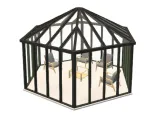 Glass gazebo with seating area